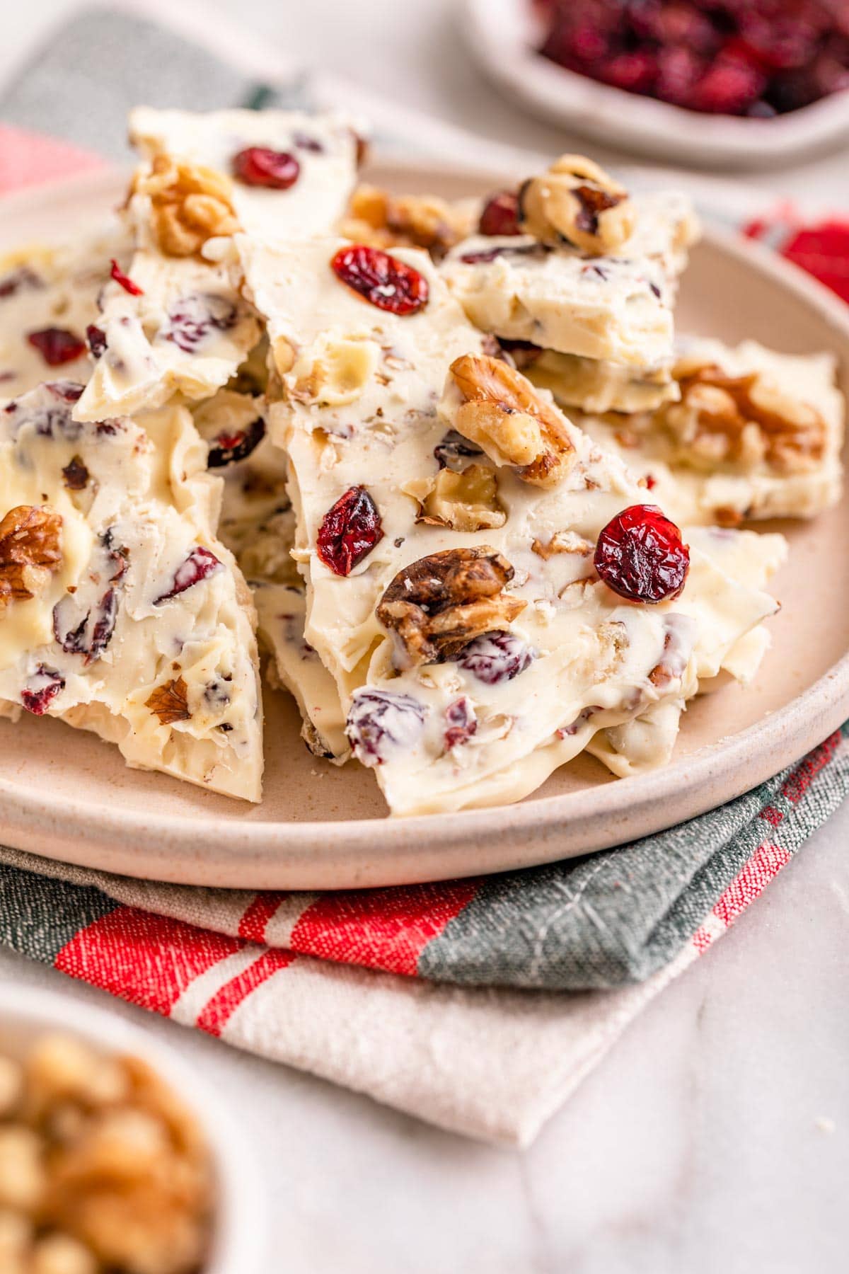 White Chocolate Cranberry Bark stacked on serving platter
