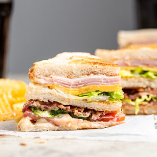 Triple Decker Club Sandwich cut on countertop 1x1