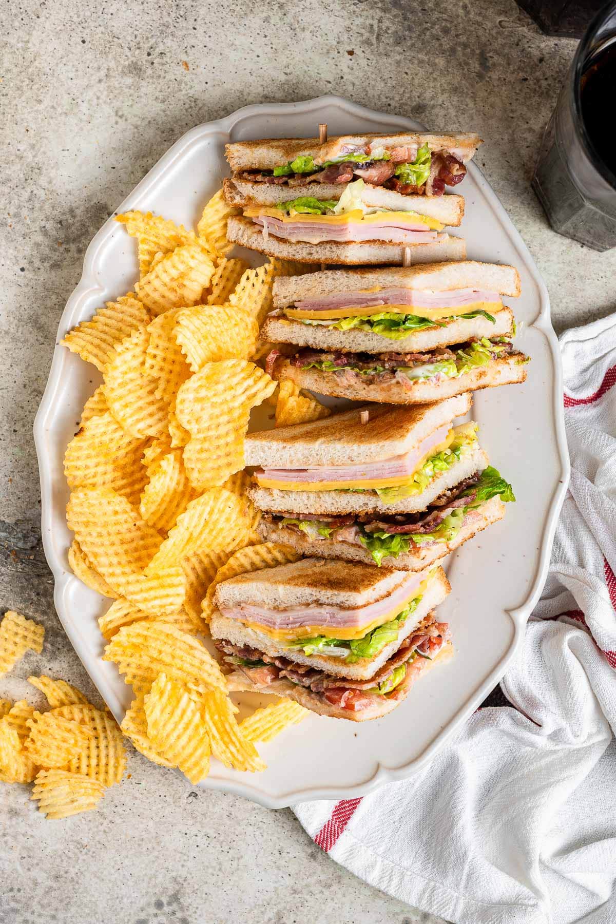 Triple Decker Club Sandwich cut on serving platter