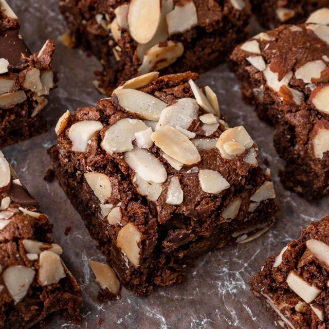 Almond Flour Chocolate Brownies baked brownie squares on parchment, 1x1