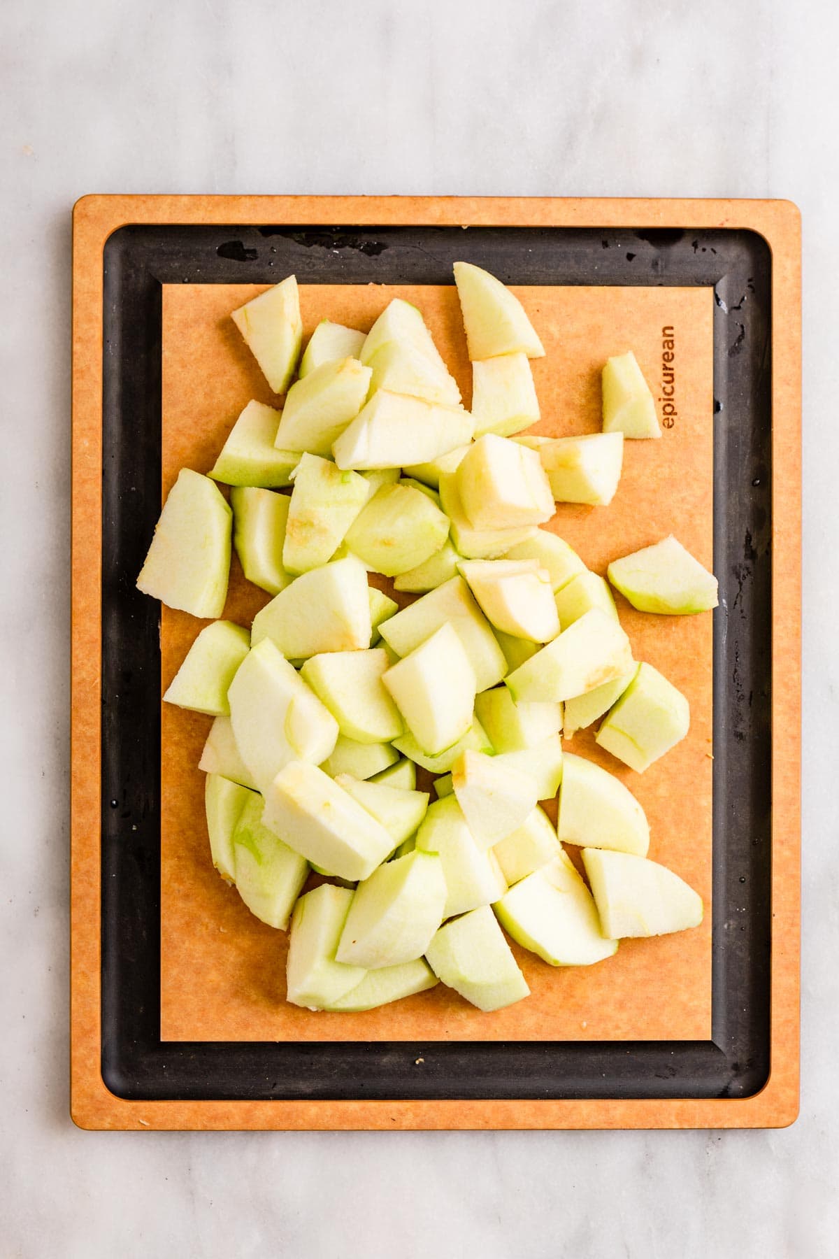 Chunky Cinnamon Applesauce sliced apples on cutting board