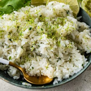 Rice with cilantro and lime in serving dish.
