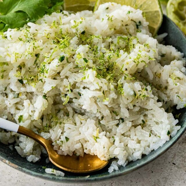 Rice with cilantro and lime in serving dish.