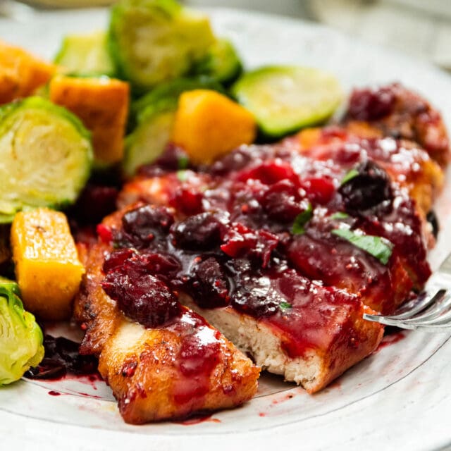 Cranberry Chicken sliced on serving plate 1x1