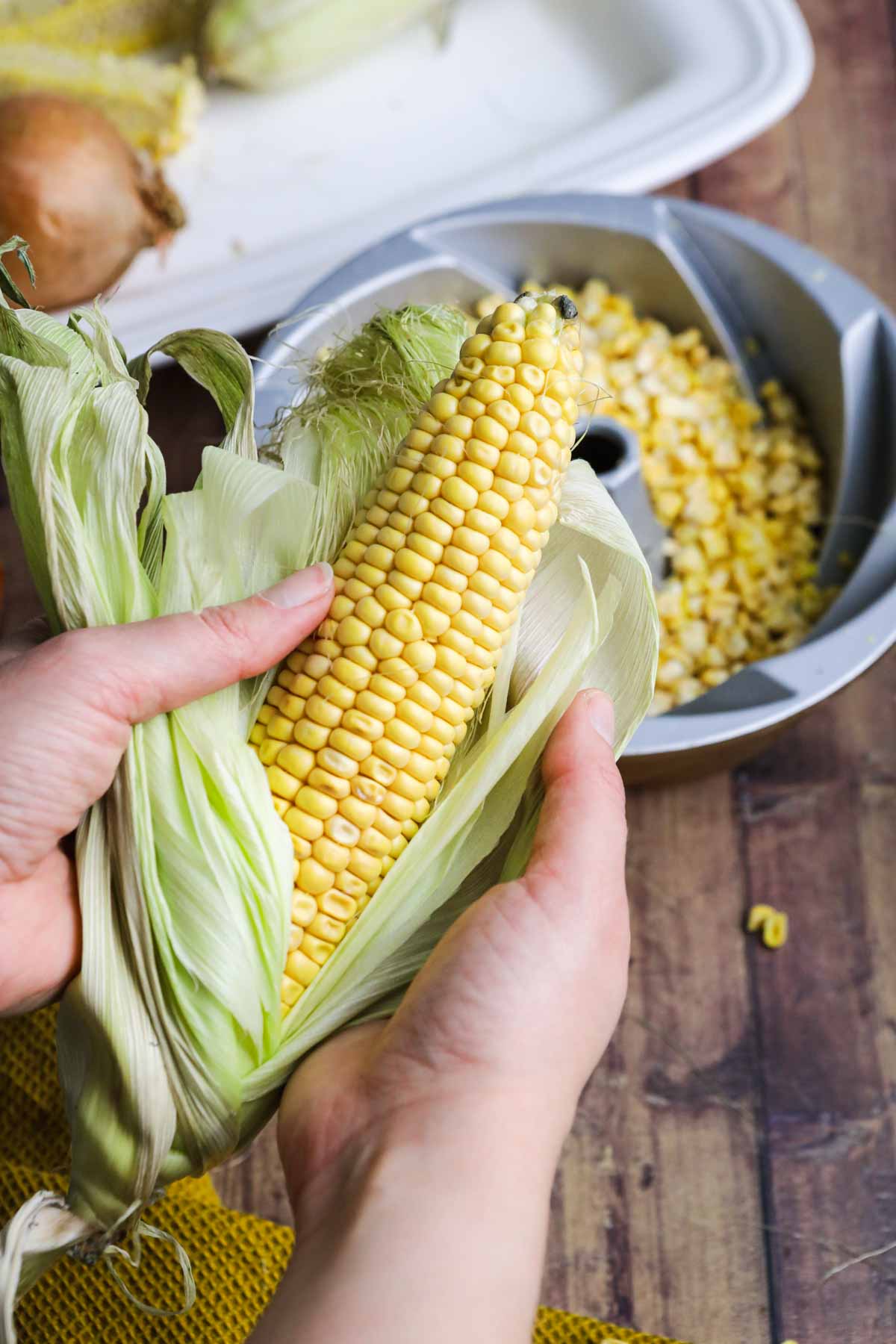 Creamed Corn ear of corn in husk