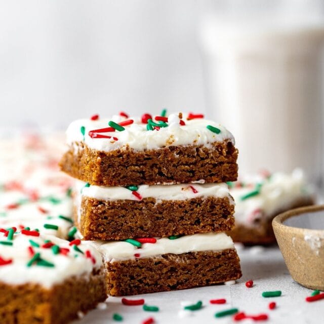 Gingerbread Cookie Bars stacked on counter 1x1