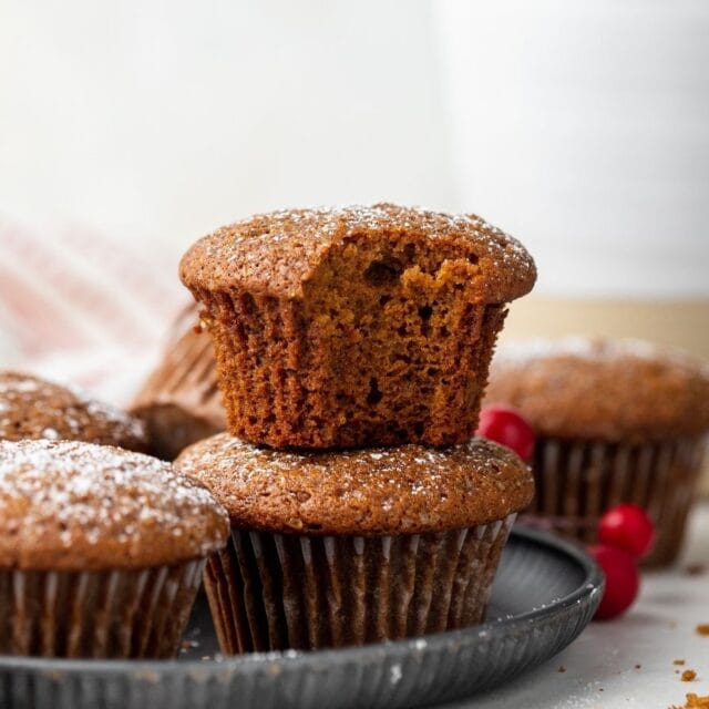 Muffins stacked on serving platter.