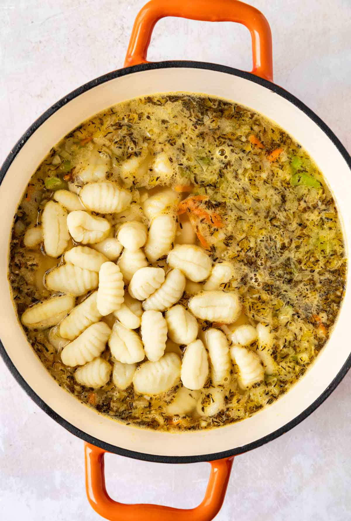 Olive Garden Chicken Gnocchi Soup gnocchi added to cooking pot