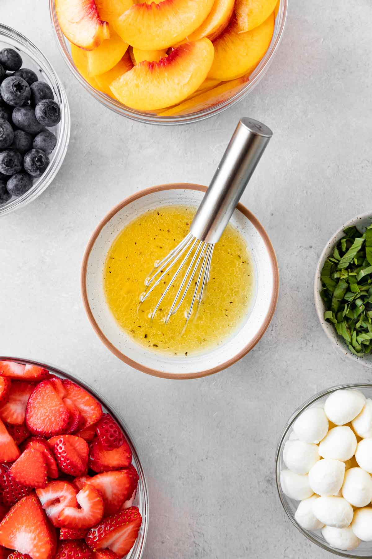 Peach Berry Caprese Salad dressing ingredients in mixing bowl