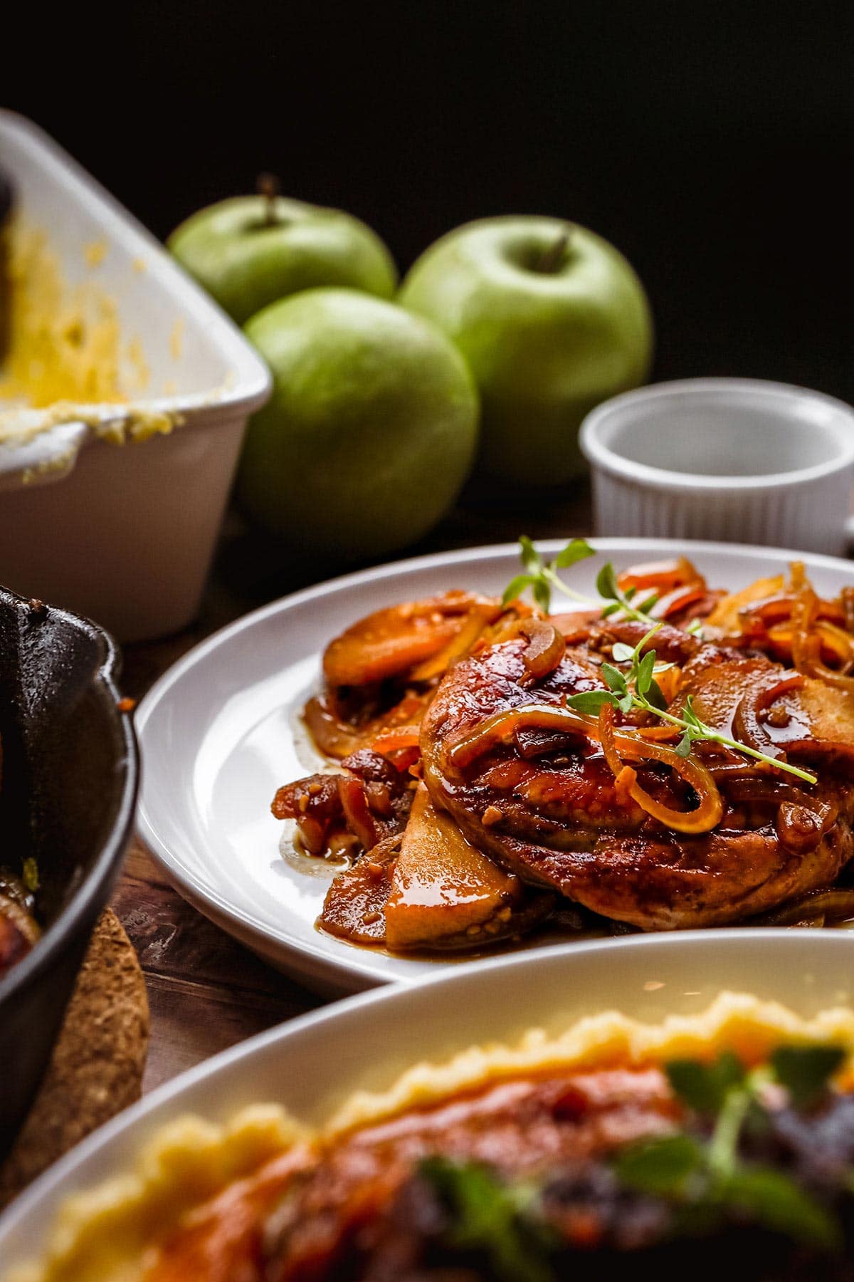 Pork Chops with Apples and Onions cooked on plate side view