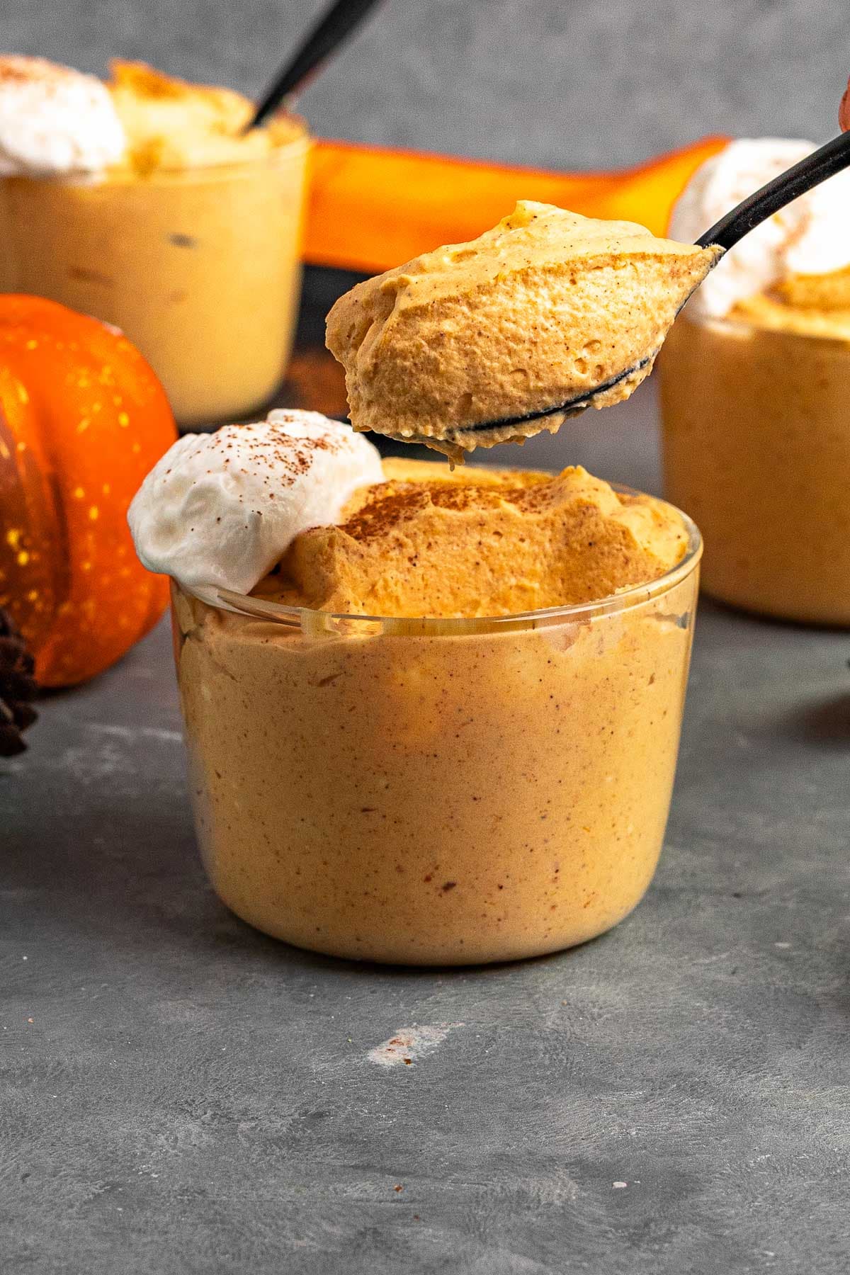 Pumpkin Mousse in serving bowl with spoonful removed