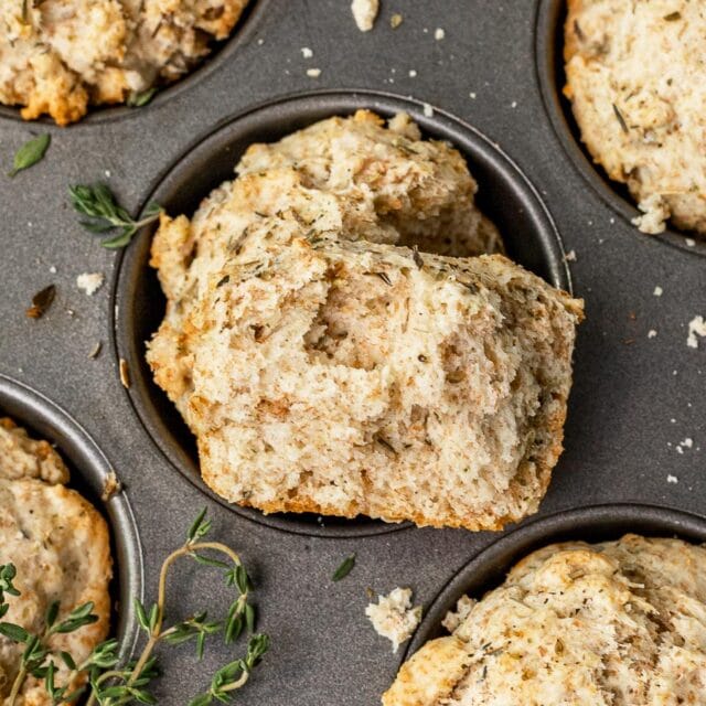 Baked Muffins in muffin tin showing interior.
