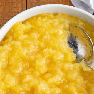 bowl of pineapple with a spoon