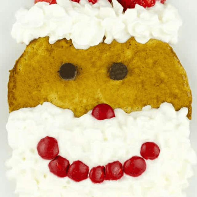 pancake that is decorated like a santa