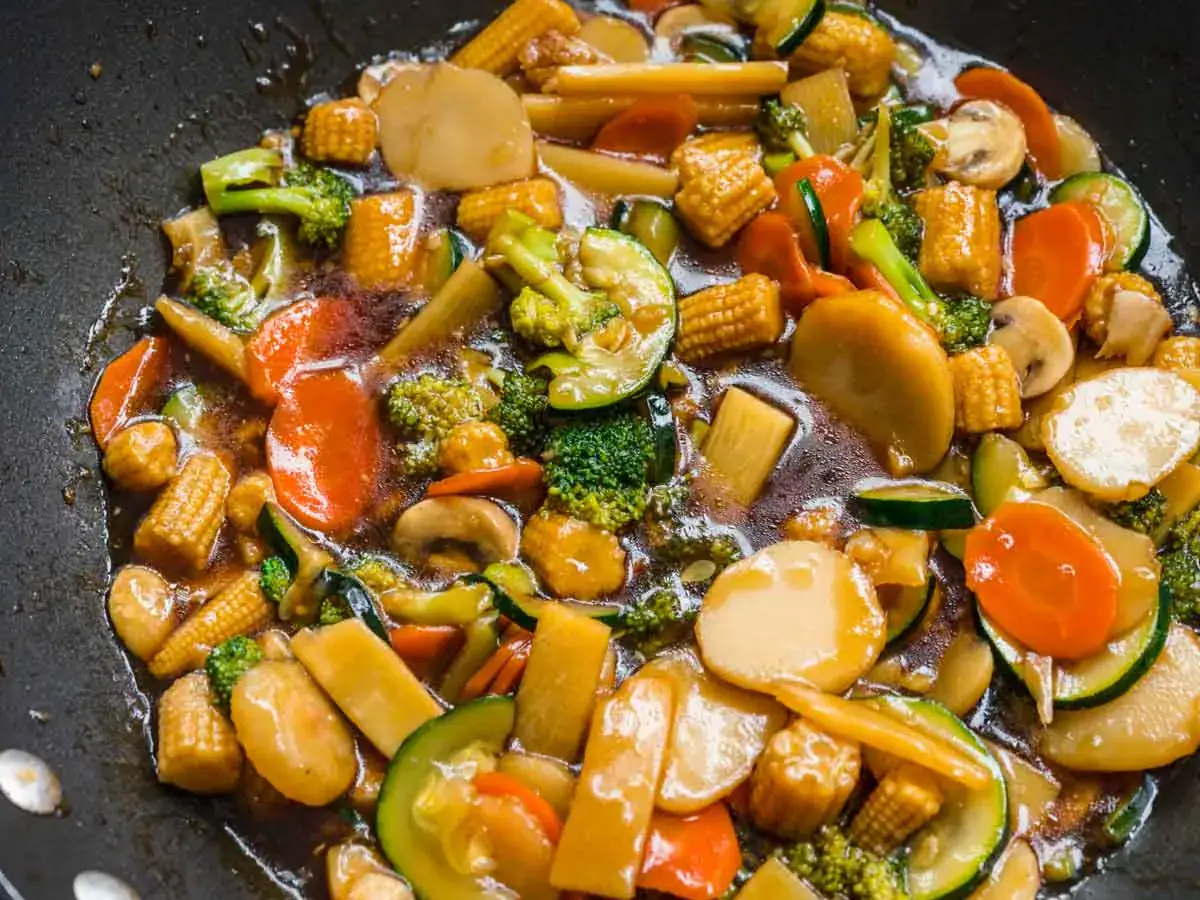 Stir fried vegetables in wok.
