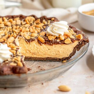 Pie in a glass dish with a slice removed