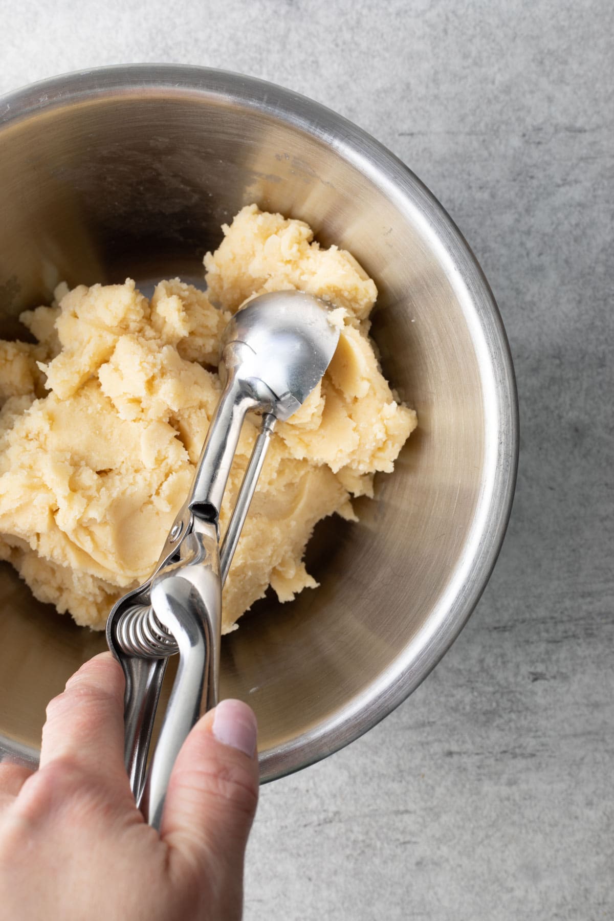 Almond Cookie dough being scooped