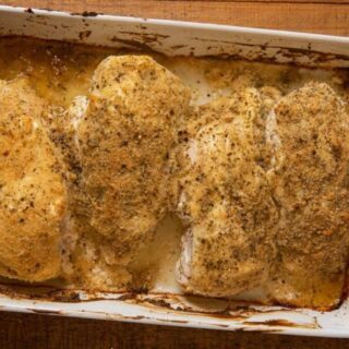 Chicken in a white baking dish