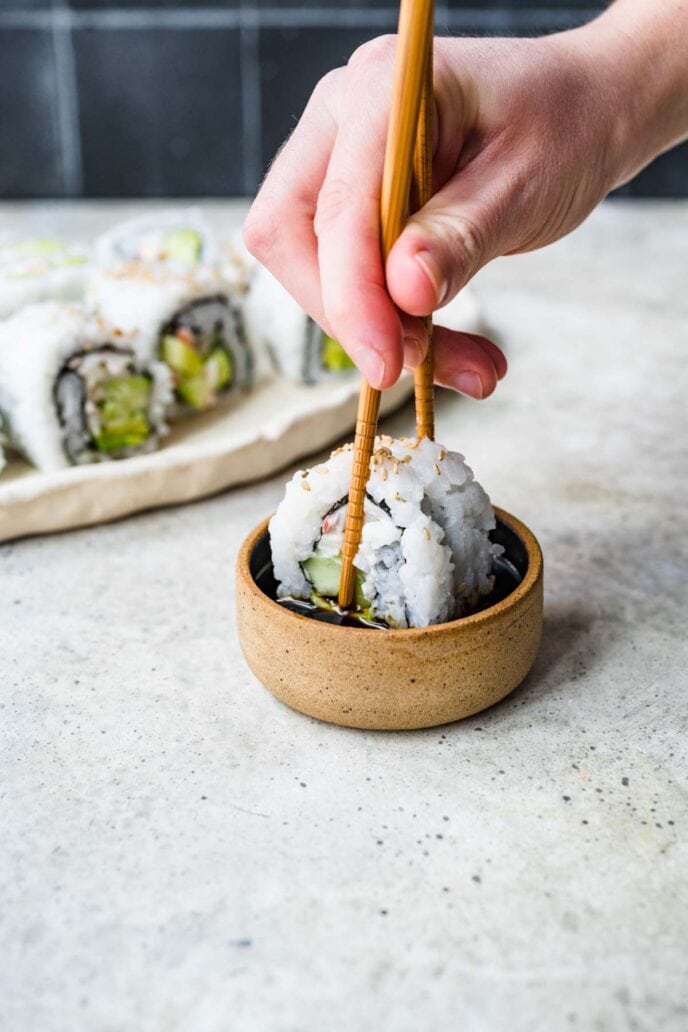 California Rolls in dipping sauce