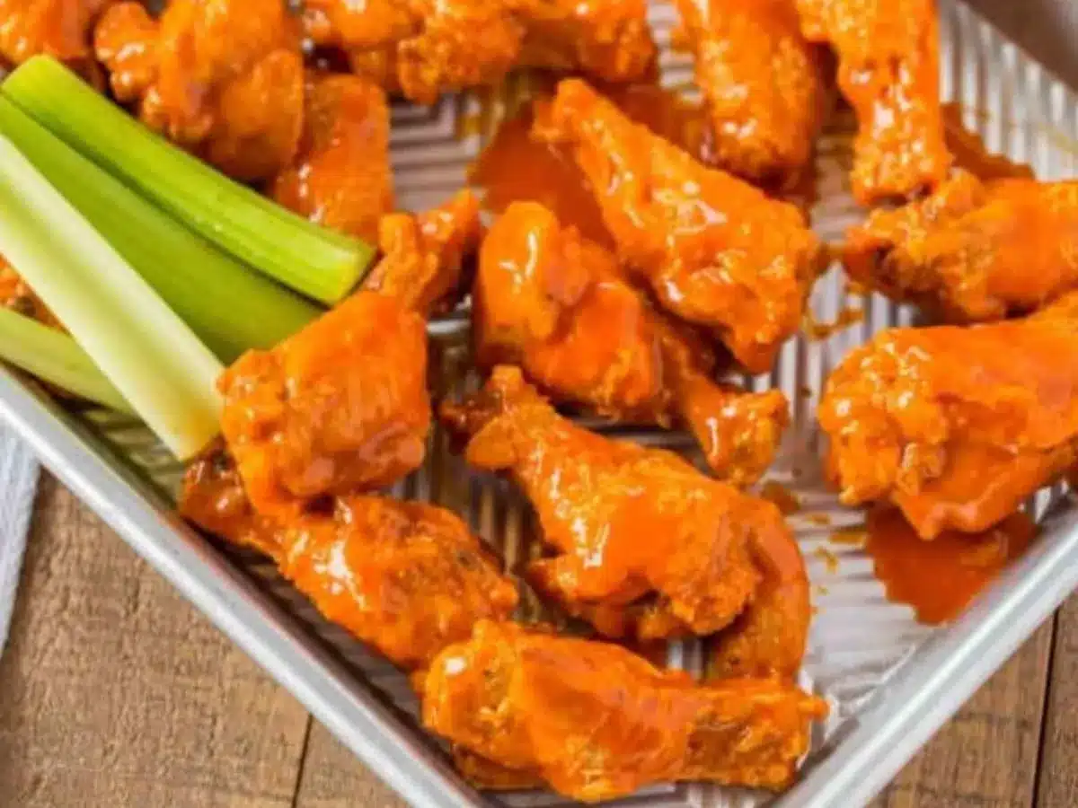 Wings on baking sheet with celery