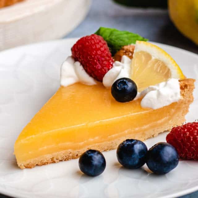 Slice of dessert tart on plate.