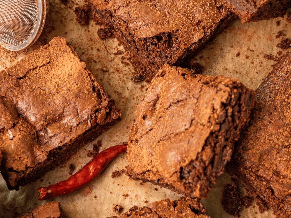 Cut up brownies spread apart.