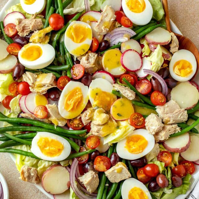 finished and plated salad with dressing
