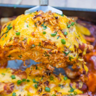 slice of Mexican Casserole being taken from pan