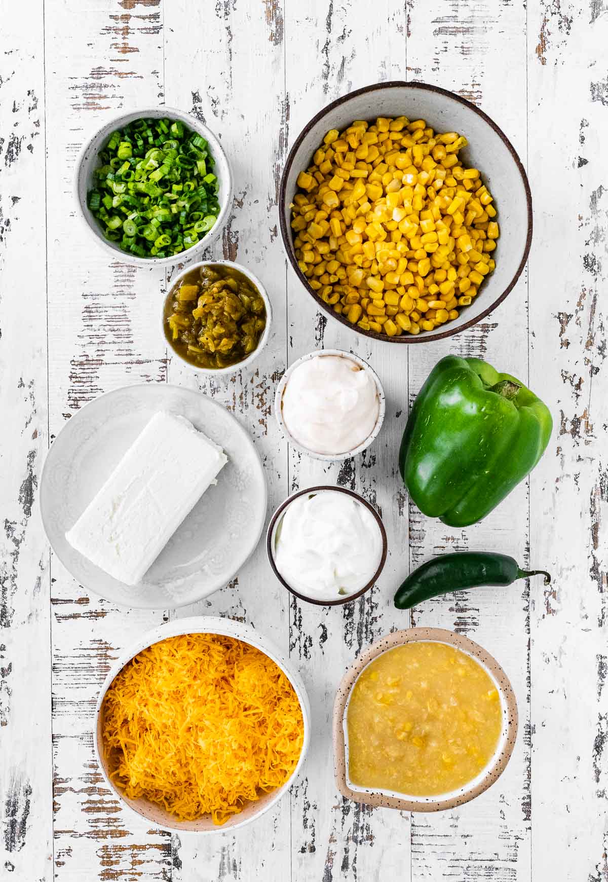 Corn Dip ingredients spread out on counter and in separate bowls
