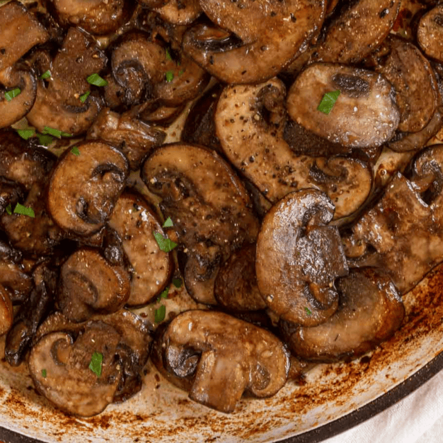 Closeup of pan with vegetables cooked