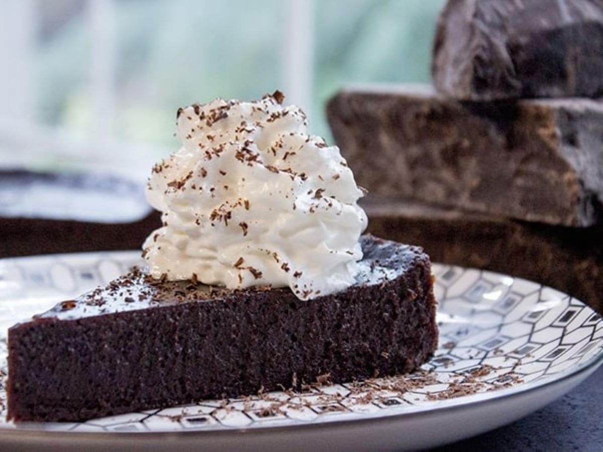 Flourless Chocolate Cake is a fudgy chocolate cake made with just 4 ingredients and just 5 minutes of work before it goes in the oven! 