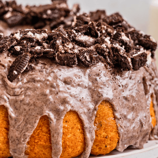 Cookies and cream baked treat with glaze and topped with crushed cookies and cream