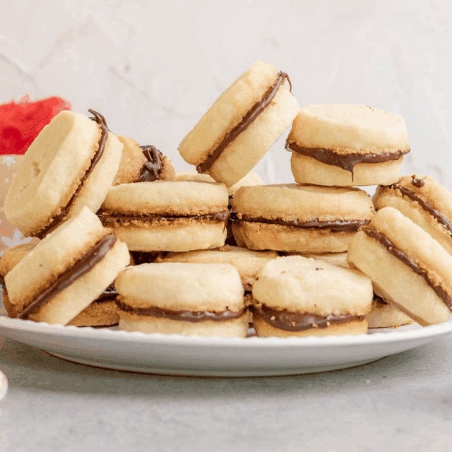 Plate of several cookies stacked