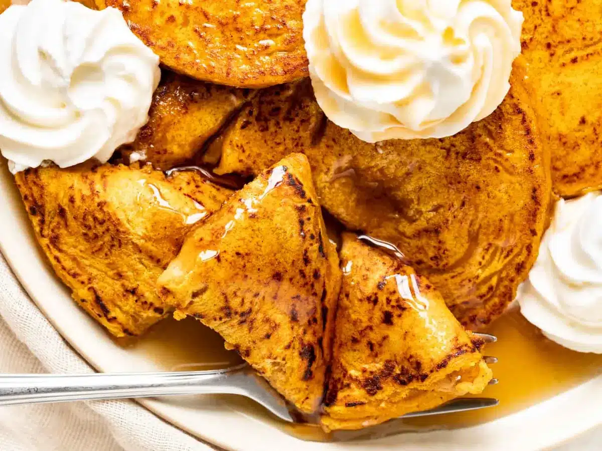 Pancake cut into bites with fork