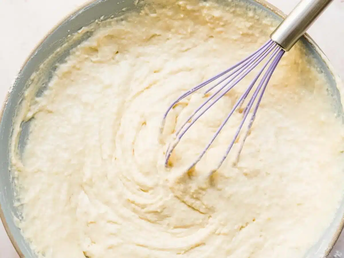 Batter in bowl with whisk.