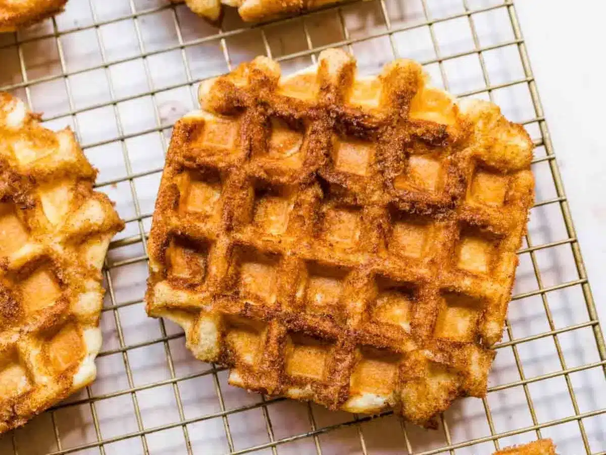 Waffles cooling on baking rack.