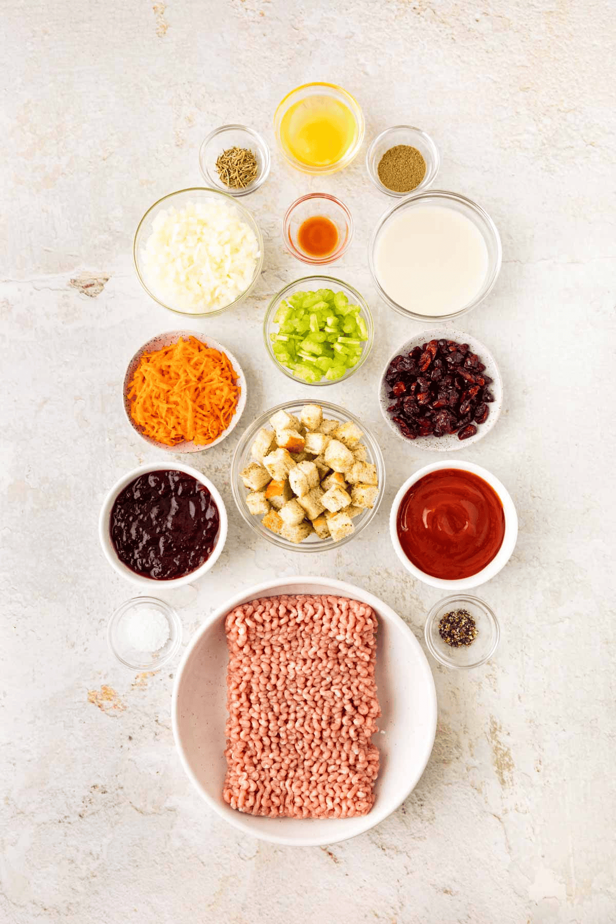 Meatloaf ingredients in separate bowls