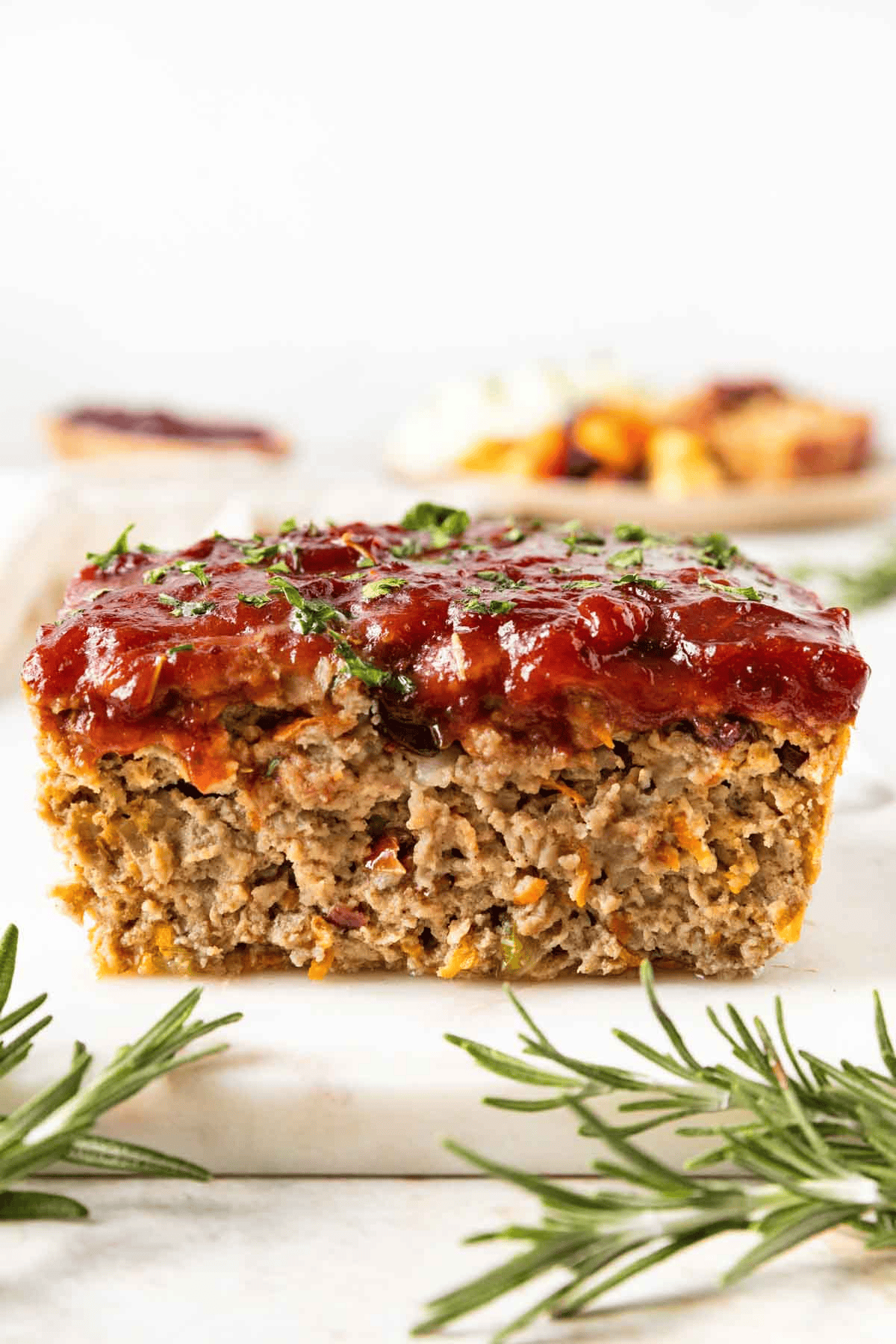 Finished meatloaf with sauce from the side