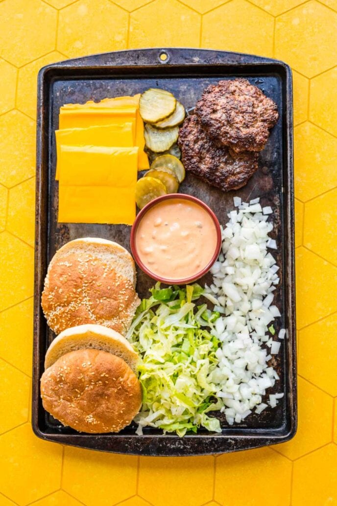 Big Mac toppings on a pan