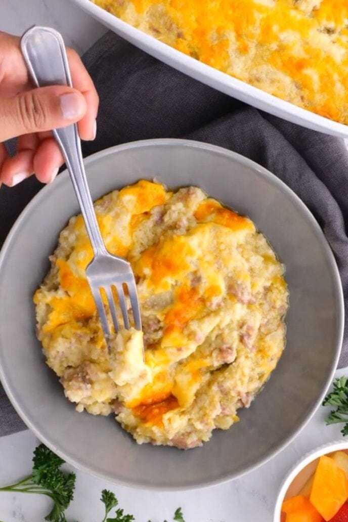 Cheesy Baked Sausage Grits in a bowl