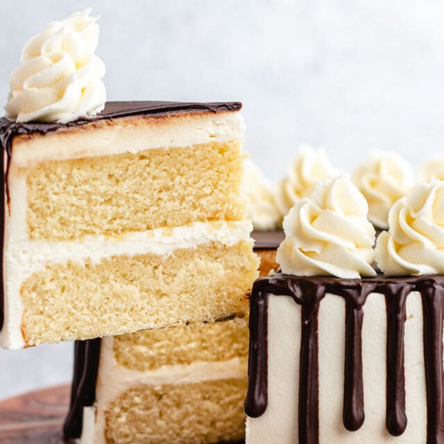 Slice of vanilla cake being served.