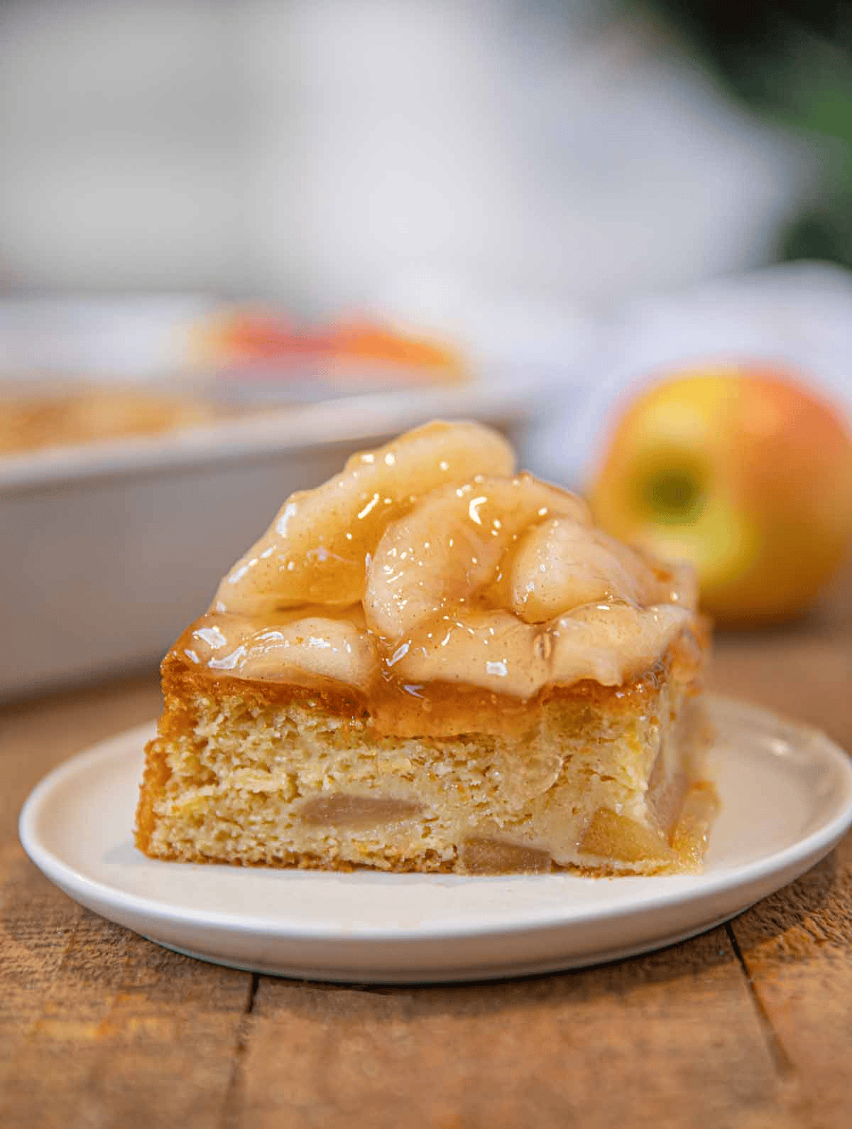 Sliced apple cake with apple filling on top