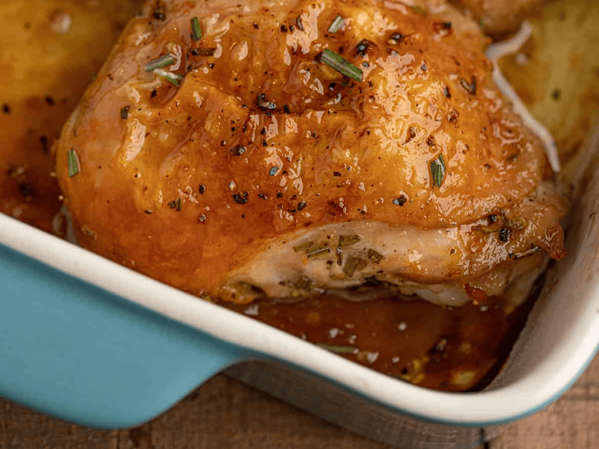 Closeup of chicken in a baking dish