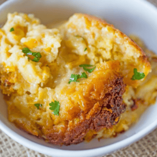 Spoonful of casserole in a white bowl