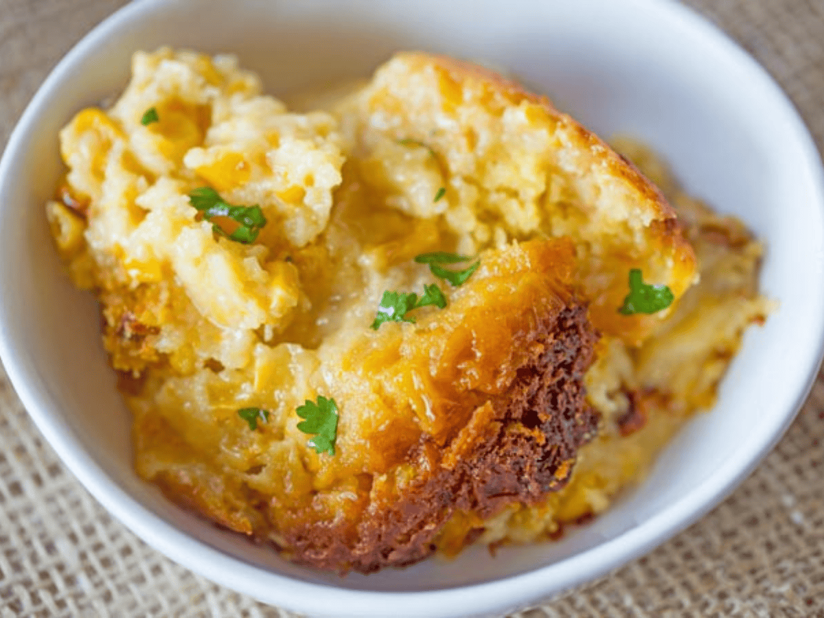 Spoonful of casserole in a white bowl