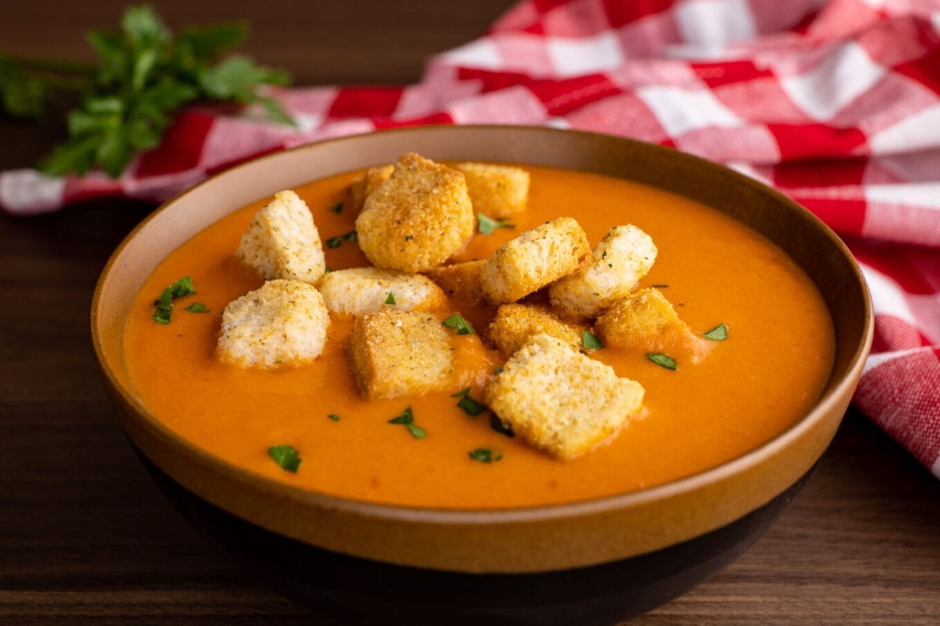 Easy Creamy Tomato Soup in bowl with croutons