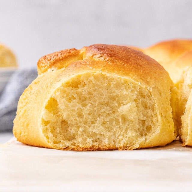 Side view of golden and delicious bread roll.