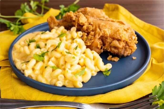 Super Creamy Macaroni and Cheese on plate with fried chicken