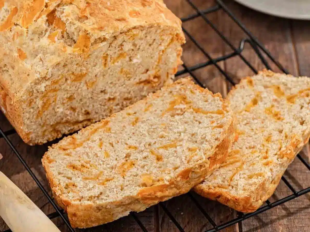 Baked loaf cooling on baking rack.
