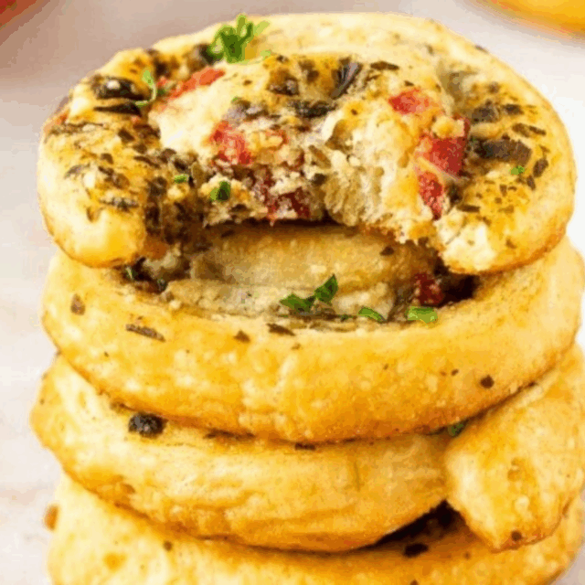 Stacked pinwheels with a bite taken out of 1